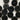 Pattern of black buttons on a white background