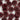 Close-up of multiple maroon buttons on a white background