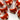 Red fox-shaped objects on a white background