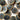 A collection of 20mm streaky blue wood buttons (J5) with a dark blue center, perfect for crafts and sewing projects.