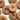 Close-up of wooden buttons on a white background