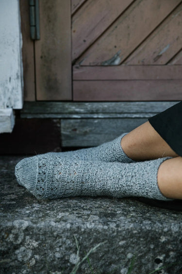 Laine | 52 Weeks of Socks | Ultimate Sock Pattern Book, , Discover 52 sock patterns by 46 designers in Laine’s iconic hardcover. A must-have for sock knitters seeking inspiration, challenge, and timeless style., Knit With Me