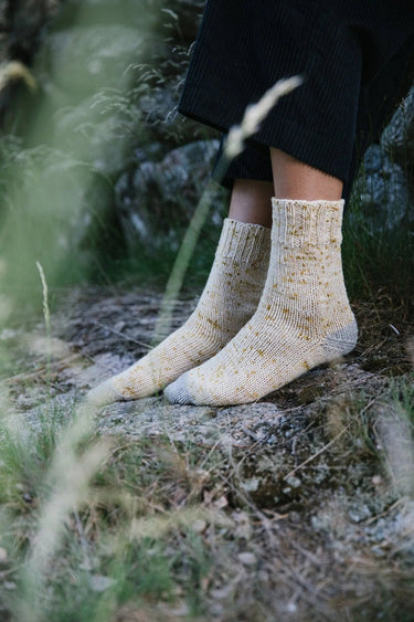 Laine | 52 Weeks of Socks | Ultimate Sock Pattern Book, , Discover 52 sock patterns by 46 designers in Laine’s iconic hardcover. A must-have for sock knitters seeking inspiration, challenge, and timeless style., Knit With Me