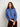 Woman wearing blue sweater featured in 52 Weeks of Sweaters pre-order book.