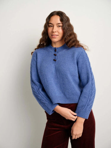 Woman wearing blue sweater featured in 52 Weeks of Sweaters pre-order book.