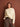 Model wearing a white knitted sweater from 52 Weeks of Sweaters book.