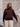 Model wearing knit sweater for Aleks Byrd - Meet & Greet, Book Signing (BOOK INCLUDED) and Trunk Show with Aleks Byrd event.