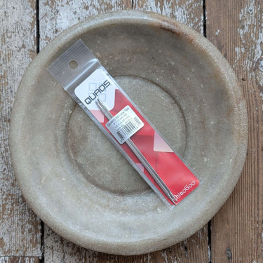 ChiaoGoo Quad Interchangable Tips in packaging on rustic wooden table