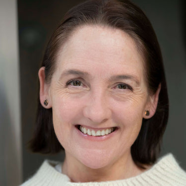 Justine Lee, instructor for Duplicate Stitch workshop, smiling.