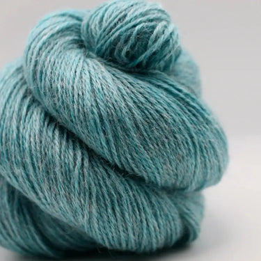 Yarnadelic Sport yarn in teal, 100% Falklands Corriedale, perfect blend of Merino and Lincoln Longwool for knitting and crocheting projects.
