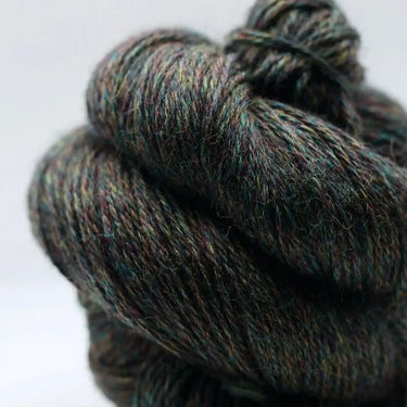 Yarnadelic Sport yarn made from 100% Falklands Corriedale, showcasing rich textures and colors for knitting and crafting enthusiasts.