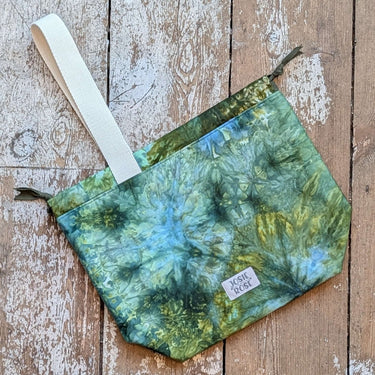 Large ice dyed Craft Project Bag with unique design and interior pockets on a wooden background.