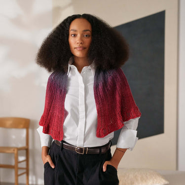 Model wearing knitted shawl showcasing Beaded Colourwork technique.