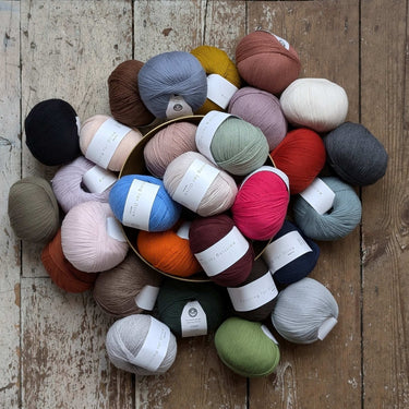 Knitting For Olive | Merino | Fingering Weight, Group Photo Soft, breathable merino wool yarn for ethical knitwear. Fingering weight, non-mulesed & ideal knitting wool UK for layering & outdoor makes, Knit With Me