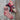Flower Yarn Knitting Kit featuring pink sock and skeins from Ainsworth & Prin on wooden background