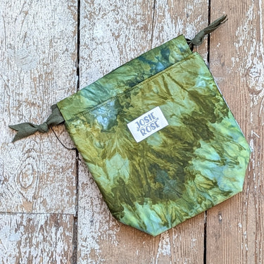 Ice Dyed Project Knitting Bag - Small, unique green Josie Rose design on wooden floor.