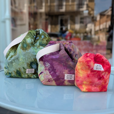 Ice Dyed Project Bags - XLarge, uniquely designed with ice dyed cotton, displayed on a table with vibrant colors and Josie Rose branding.