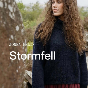 Woman wearing Stormfell sweater made from Laine x Novita DK in a natural setting