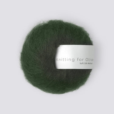 Knitting For Olive Soft Silk Mohair yarn ball in dark green, luxurious Kid Mohair and Mulberry silk blend, perfect for knitting projects.