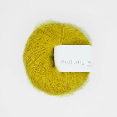 Knitting For Olive Soft Silk Mohair yarn in yellow color, luxurious blend of Kid Mohair and Mulberry silk, perfect for knitting projects.