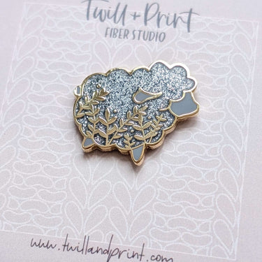 Twill + Print Enamel Pins - Little Glitter Sheep design with shiny enamel finish on a decorative card.