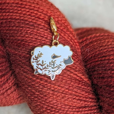 Twill + Print Progress Keepers with lobster claw on red yarn for knitting or crochet marking.