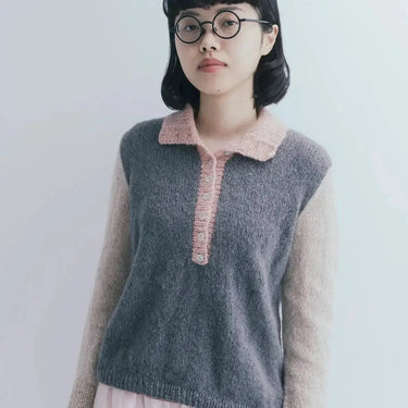 Model wearing a top-down sweater from Amirisu Assemblage Vol. 2 collection, showcasing knitting style and technique.