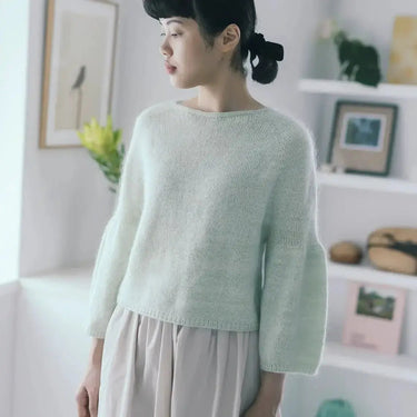 Model wearing top-down sweater from Amirisu Assemblage Vol. 2 collection