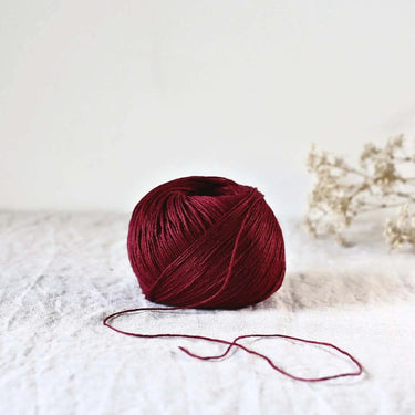De Rerum Natura | Antigone Yarn | Silky Linen for Summer, Colour: Grenet, De Rerum Natura Antigone is 100% linen yarn with a silky, cool feel. Perfect for summer knits like tops and cardigans. Naturally grown flax. Shop eco yarns now, Knit With Me