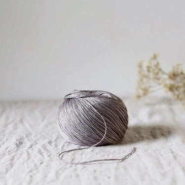 De Rerum Natura | Antigone Yarn | Silky Linen for Summer, Colour: Heron, De Rerum Natura Antigone is 100% linen yarn with a silky, cool feel. Perfect for summer knits like tops and cardigans. Naturally grown flax. Shop eco yarns now, Knit With Me