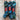 Three skeins of A&P Lace Silk Mohair yarn in shades of blue and green, hand dyed for unique softness and texture.