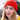 Person wearing a red knitted hat, outdoors, Archipelago Knitting style