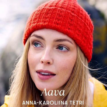 Person wearing a red knitted hat, outdoors, Archipelago Knitting style