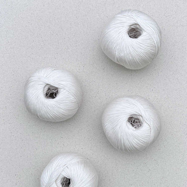 Arctic Pearl by Pascuali, colour: White 03,Arctic Pearl is a luxurious vegan yarn made from 100% Lyocell (SEACELL). Soft, skin-friendly, eco-conscious & machine washable. Perfect for sensitive skin