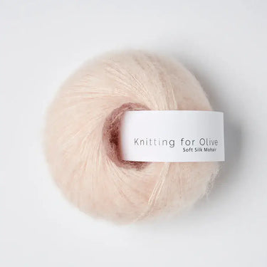 Knitting For Olive | Soft Silk Mohair, colour: Ballerina, A luxurious mohair yarn blend. Finest Kid Mohair and Mulberry silk fingering yarn. This yarn is incredible held double or with Knitting For Olive Merino, Knit With Me