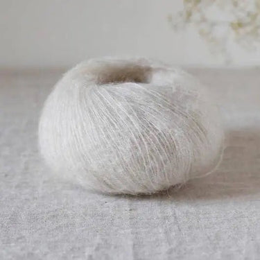 De Rerum Natura| Bérénice | Goat Fibres | Soft Yarn, Color: Orgeat, Bérénice is a unique blend of animal welfare Angora goat and the soft, plump Merino wool from organic Merinos d'Arles. Fingering yarn, dyed from ecological dye, Knit With Me