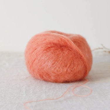 Bérénice lace weight yarn ball in soft plump wool and shiny silk, dyed using ecological dyes