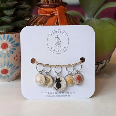 Bobbles & Berries | Stitch Marker Set | Hand-Embroidered Art, Style: Whiskers and Wool, Discover Bobbles & Berries hand-embroidered stitch markers, inspired by Scottish nature. Lightweight, smooth, and perfect for mindful, snag-free knitting., Knit With M