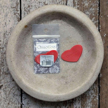 ChiaoGoo Rubber Grippers in heart shape on wooden surface for Mini Tips and Cables.