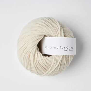Knitting for Olive Heavy Merino yarn ball made of 100% Merino wool, natural and soft texture, sourced from mulesing-free sheep in New Zealand.