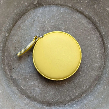 Yellow round Colourful Tape Measure with retractable mechanism, perfect for sewing and knitting projects, measures up to 150cm.