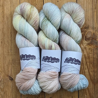 Zakami | Corriedale | Small Batch Yarn, Colour: Exordium, Corriedale strikes the perfect balance of hard-wearing and supple. This yarn is perfect for socks and other projects such as hats and jumpers and offers great stitch definition. It works as a wonde