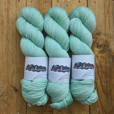 Zakami | Corriedale | Small Batch Yarn, Colour: Hint Of Mint, Corriedale strikes the perfect balance of hard-wearing and supple. This yarn is perfect for socks and other projects such as hats and jumpers and offers great stitch definition. It works as a w