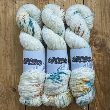 Zakami | Corriedale | Small Batch Yarn, Colour: Luminent Labyrynth, Corriedale strikes the perfect balance of hard-wearing and supple. This yarn is perfect for socks and other projects such as hats and jumpers and offers great stitch definition. It works