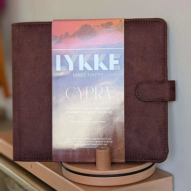LYKKE Cypra Copper Double Pointed Needle Set in brown case, ideal for knitting projects like socks and sleeves.