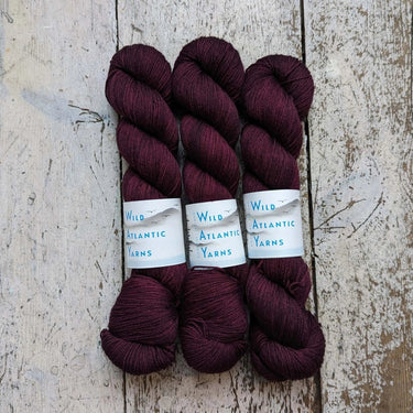 Wild Atlantic| Emer | Organic Merino Wool, Colour: Mulled Wine, Emer is a beautifully squishable organic merino wool. This fine base is wonderfully soft, making it the perfect match for next to skin garments and accessories. 4-ply/fingering weight 100g/40