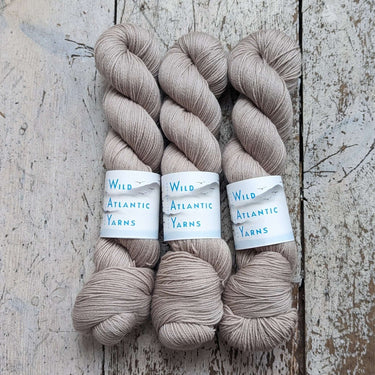Wild Atlantic| Emer | Organic Merino Wool, Colour: Sandstone, Emer is a beautifully squishable organic merino wool. This fine base is wonderfully soft, making it the perfect match for next to skin garments and accessories. 4-ply/fingering weight 100g/400m