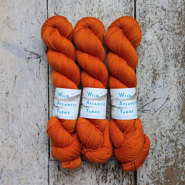 Wild Atlantic| Emer | Organic Merino Wool, Colour: Sunset, Emer is a beautifully squishable organic merino wool. This fine base is wonderfully soft, making it the perfect match for next to skin garments and accessories. 4-ply/fingering weight 100g/400m. V