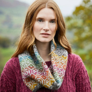 Woman wearing Ennerdale Cowl Kit by Marie Wallin, showcasing Fairisle pattern from Westmorland collection.