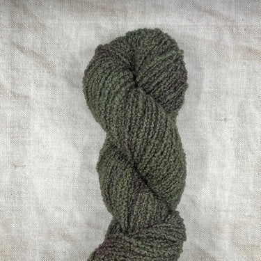 Wild Atlantic | Eriu | Super Soft Merino, Colour: Olive Grove, Ériu ("air-oo") is a super soft merino yarn. The boucle texture makes it incredibly versatile, allowing it to be a substitute yarn in patterns calling for DK or worsted weights, adding a beaut